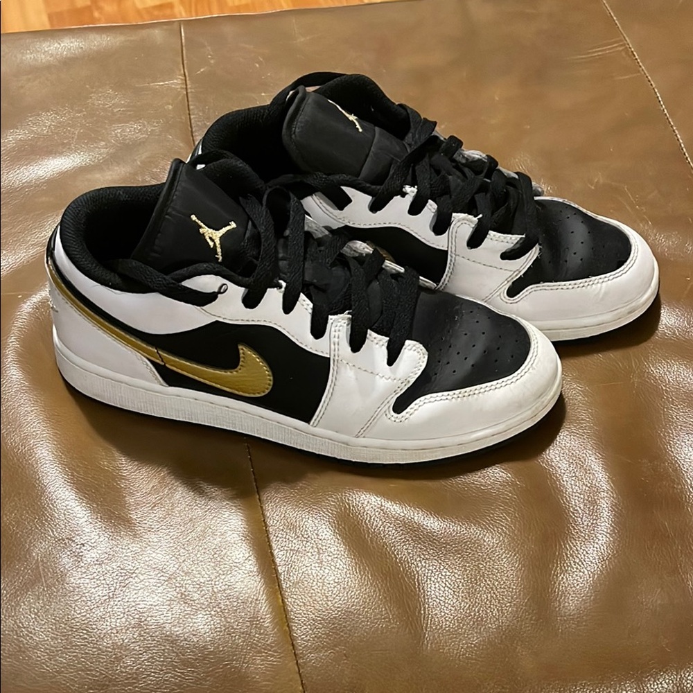 Jordan Black and Gold Sneakers Iconic Style